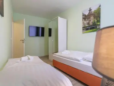 Ein Bett oder Betten in einem Zimmer der Unterkunft Ferienwohnung Schlossblick, Wernigerode