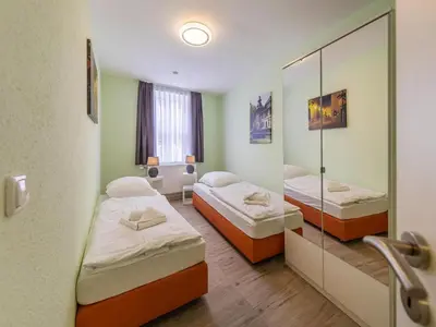 Ein Bett oder Betten in einem Zimmer der Unterkunft Ferienwohnung Schlossblick, Wernigerode