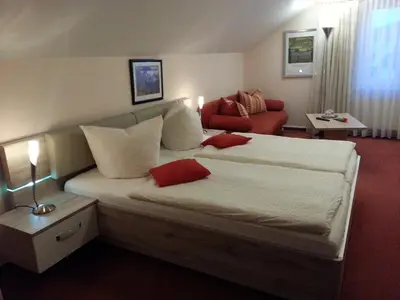 Ein Bett oder Betten in einem Zimmer der Unterkunft Villa HarzFokus - #Hotel#Pension#Frühstück