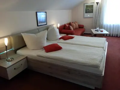 Ein Bett oder Betten in einem Zimmer der Unterkunft Villa HarzFokus - #Hotel#Pension#Frühstück