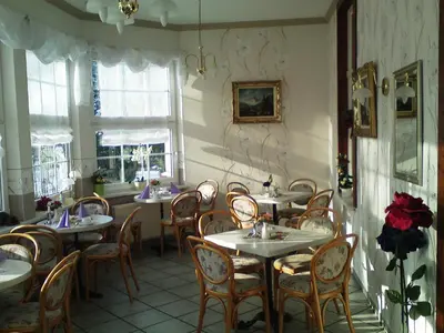 Ein Sitzbereich in der Unterkunft Villa HarzFokus - #Hotel#Pension#Frühstück