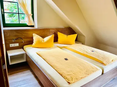 Ein Bett oder Betten in einem Zimmer der Unterkunft Hotel Zum Klosterfischer
