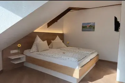 Ein Bett oder Betten in einem Zimmer der Unterkunft Hotel Zum Klosterfischer