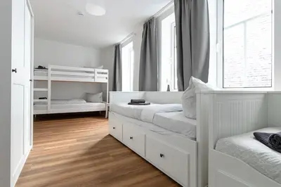 Ein Bett oder Betten in einem Zimmer der Unterkunft Ferienwohnung Steinbrücke Quedlinburg
