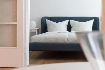Ein Bett oder Betten in einem Zimmer der Unterkunft Ferienwohnung Steinbrücke Quedlinburg
