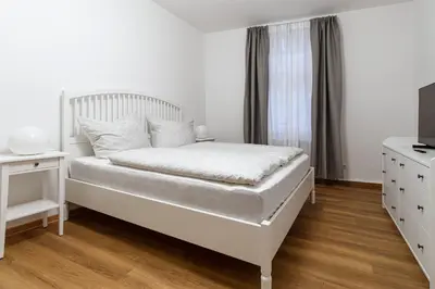 Ein Bett oder Betten in einem Zimmer der Unterkunft Ferienwohnung Steinbrücke Quedlinburg