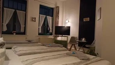 Ein Bett oder Betten in einem Zimmer der Unterkunft Hotel Villa Alice