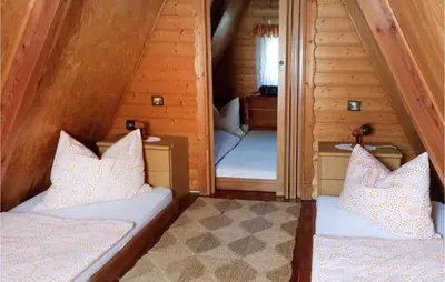 Ein Bett oder Betten in einem Zimmer der Unterkunft Ferienhaus Auf Den Thie I
