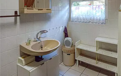 Ein Badezimmer in der Unterkunft Ferienhaus Auf Den Thie I
