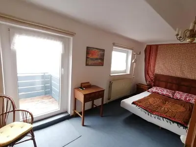 Ein Bett oder Betten in einem Zimmer der Unterkunft Hexenstübchen