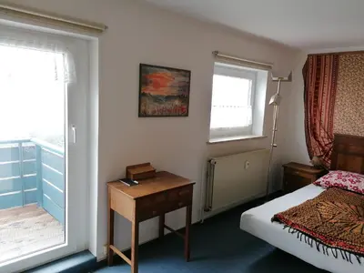 Ein Bett oder Betten in einem Zimmer der Unterkunft Hexenstübchen