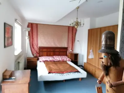 Ein Bett oder Betten in einem Zimmer der Unterkunft Hexenstübchen