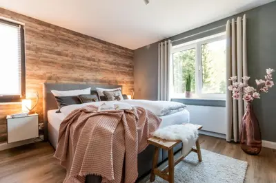 Ein Bett oder Betten in einem Zimmer der Unterkunft Harzfalke Apartment - Ankommen und wohlfühlen.