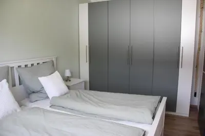 Ein Bett oder Betten in einem Zimmer der Unterkunft Harzbutze 60