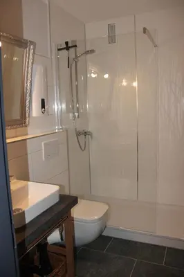 Ein Badezimmer in der Unterkunft Harzbutze 60