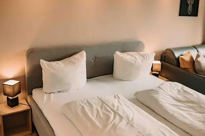 Ein Bett oder Betten in einem Zimmer der Unterkunft Haus am See HS 721 B