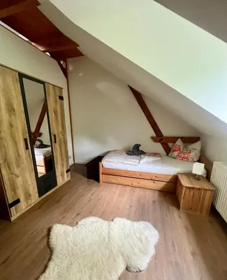 Ein Bett oder Betten in einem Zimmer der Unterkunft Ferienwohnung Bahnsteig 1