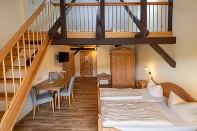 Ein Bett oder Betten in einem Zimmer der Unterkunft Am Anger