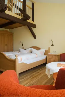Ein Bett oder Betten in einem Zimmer der Unterkunft Am Anger