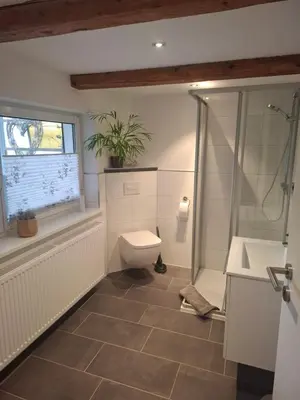 Ein Badezimmer in der Unterkunft Ferienwohnung Alte Glaserei