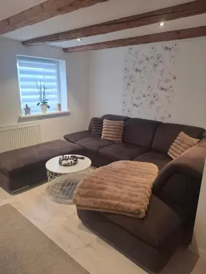 Ein Sitzbereich in der Unterkunft Ferienwohnung Alte Glaserei