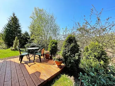 Ein Garten an der Unterkunft Ferienblockhaus 'Am Kunstberg'