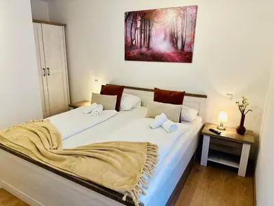 Ein Bett oder Betten in einem Zimmer der Unterkunft FeWo Esche mit Balkon #Netflix #Innenstadtnähe von Harztraveler