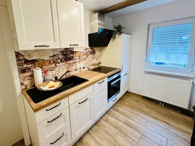 Küche/Küchenzeile in der Unterkunft FeWo Bergahorn mit Wintergarten #Fernblick#Netflix und vieles mehr von Harztraveler