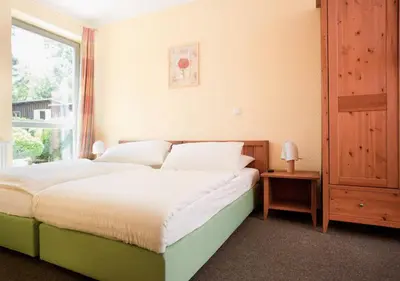 Ein Bett oder Betten in einem Zimmer der Unterkunft Landhaus Tonmühle