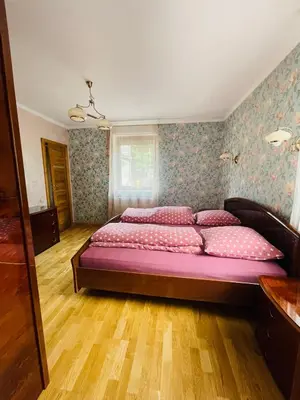 Ein Bett oder Betten in einem Zimmer der Unterkunft Gemütliches Apartment mit Kamin und Wohnküche