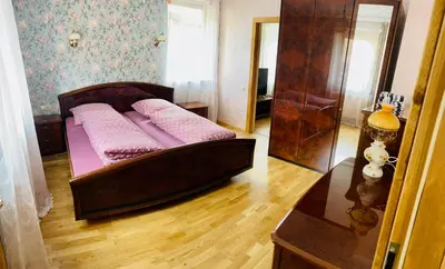 Ein Bett oder Betten in einem Zimmer der Unterkunft Gemütliches Apartment mit Kamin und Wohnküche