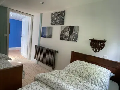 Ein Bett oder Betten in einem Zimmer der Unterkunft Hexenhaus im Jagdhof Carlshaus