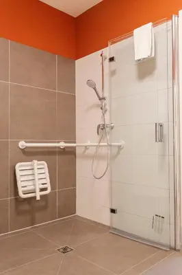 Ein Badezimmer in der Unterkunft WR Rote Ferienwohnung in der alten Apotheke
