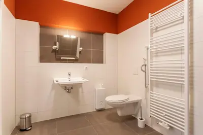 Ein Badezimmer in der Unterkunft WR Rote Ferienwohnung in der alten Apotheke