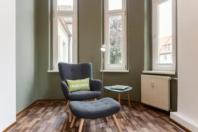 Ein Sitzbereich in der Unterkunft WR Grüne Ferienwohnung in der alten Apotheke