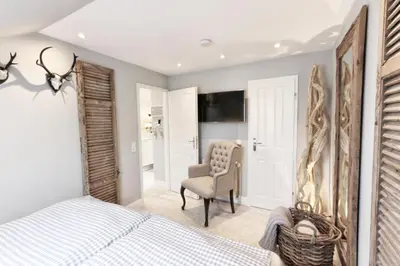 TV/Unterhaltungsangebot in der Unterkunft HOME Suites Maisonette mit Sauna
