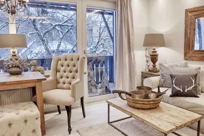 Ein Sitzbereich in der Unterkunft HOME Suites Apartment 5