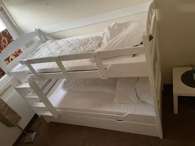 Ein Bett oder Betten in einem Zimmer der Unterkunft Fewo Vierjahreszeiten