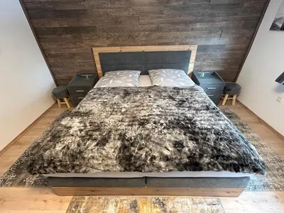 Ein Bett oder Betten in einem Zimmer der Unterkunft Haus Harzlich