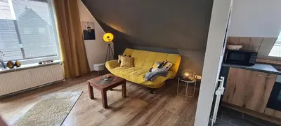 Ein Sitzbereich in der Unterkunft Aaron IV inkl Bettwäsche Handtücher Endreinigung