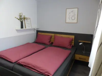Ein Bett oder Betten in einem Zimmer der Unterkunft Ferienwohnung Jesse