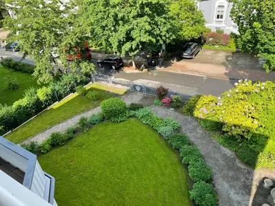 Ein Garten an der Unterkunft Ferienwohnung: Villa Eichbaum