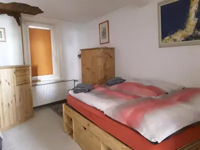 Ein Bett oder Betten in einem Zimmer der Unterkunft Bergmannhaus