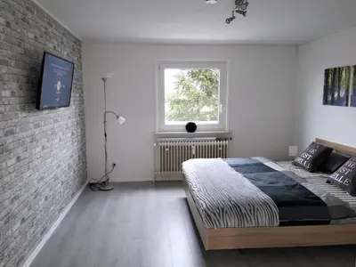 Ein Bett oder Betten in einem Zimmer der Unterkunft Fewo Penthouse am Wildpark