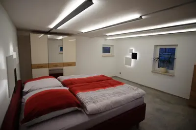 Ein Bett oder Betten in einem Zimmer der Unterkunft Ferienhaus im Obstgarten