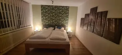 Ein Bett oder Betten in einem Zimmer der Unterkunft Ferienhaus Aaron inkl Bettwäsche Handtücher Endreinigung