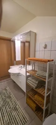 Ein Bett oder Betten in einem Zimmer der Unterkunft Ferienhaus Aaron inkl Bettwäsche Handtücher Endreinigung