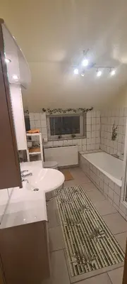 Ein Badezimmer in der Unterkunft Ferienhaus Aaron inkl Bettwäsche Handtücher Endreinigung