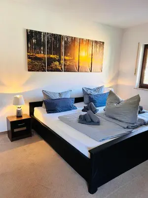 Ein Bett oder Betten in einem Zimmer der Unterkunft Apartment am Park