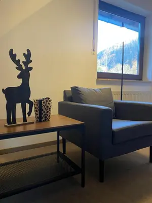 Ein Sitzbereich in der Unterkunft Apartment am Park